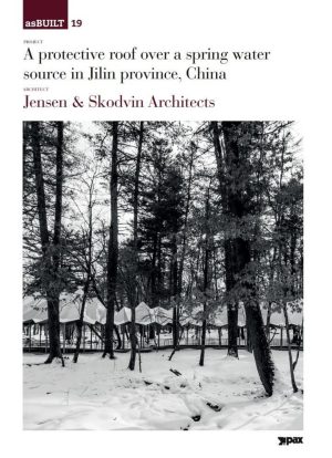 A protective roof over a spring water source in Jilin province, China